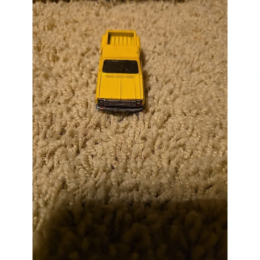 vintage 1:64 scale Chevrolet Stepside Pickup die-cast toy truck.